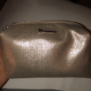 Gold makeup bag